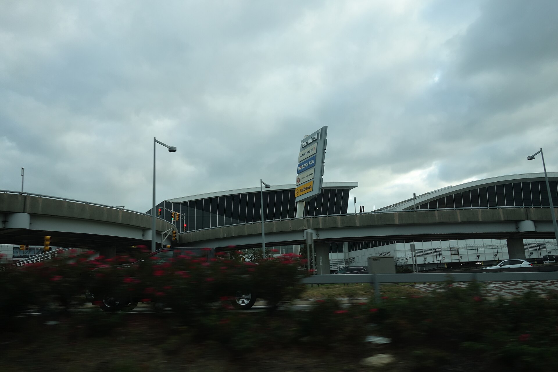 Traveling east on the Van Wyck Expressway through the central terminal area of John F. Kennedy International Airport, near South Ozone Park, Queens. Pictured is Terminal 1, one of 