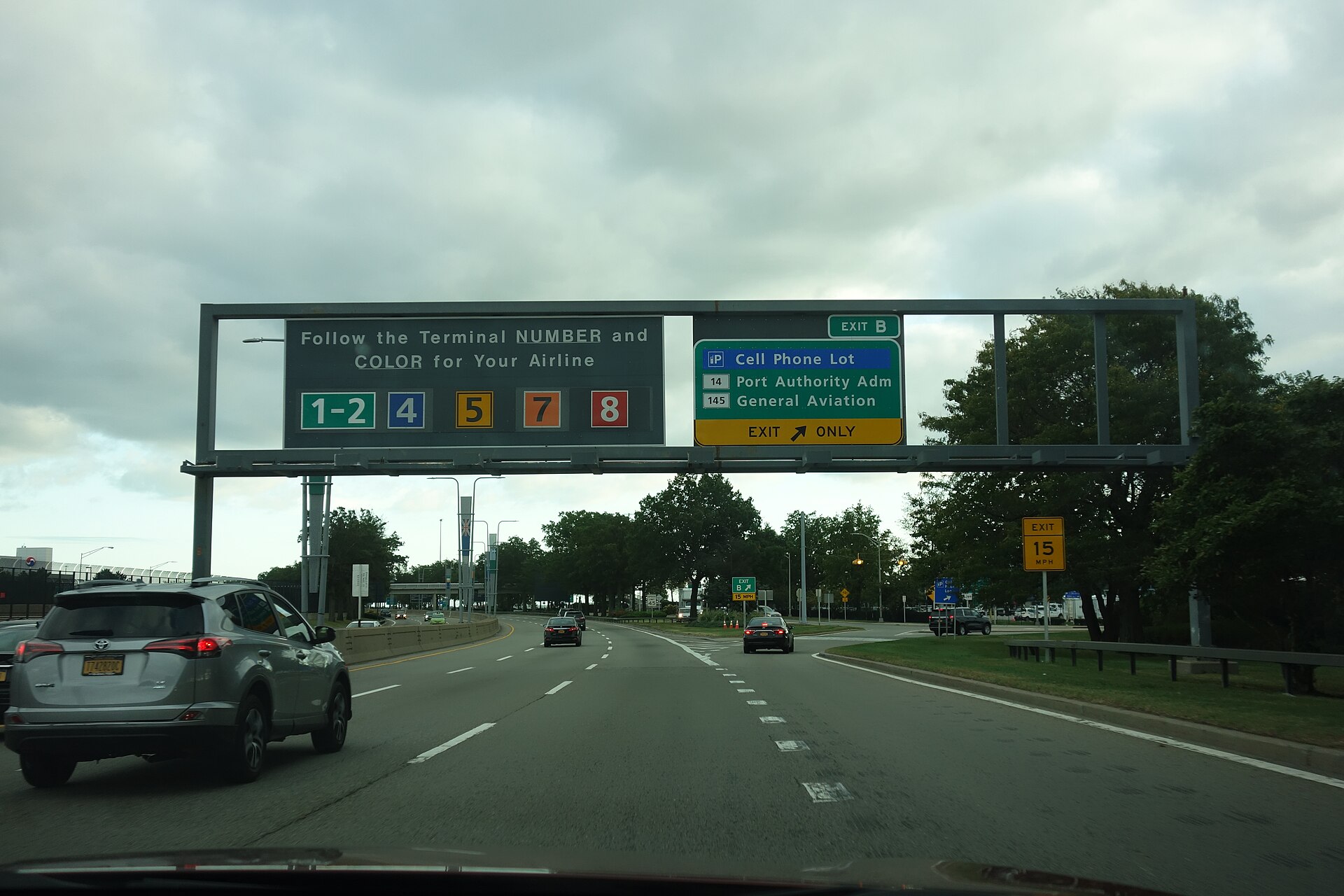 Traveling south on the Van Wyck Expressway towards the terminals of John F. Kennedy International Airport, near South Ozone Park, Queens.